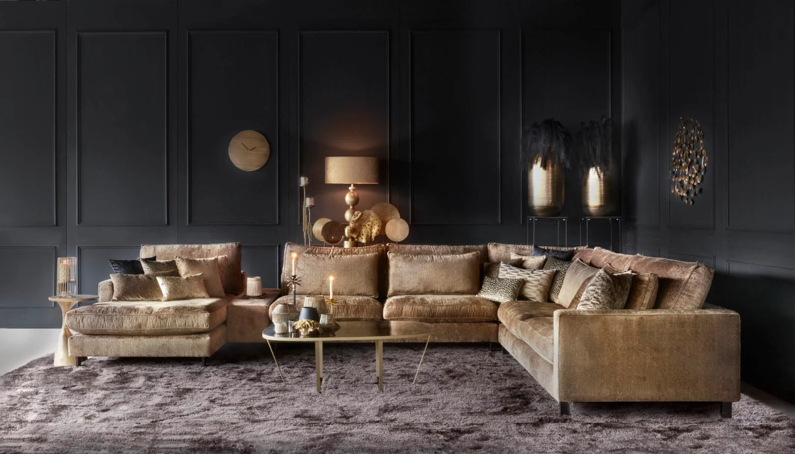 Dark setting sofa with gold trim